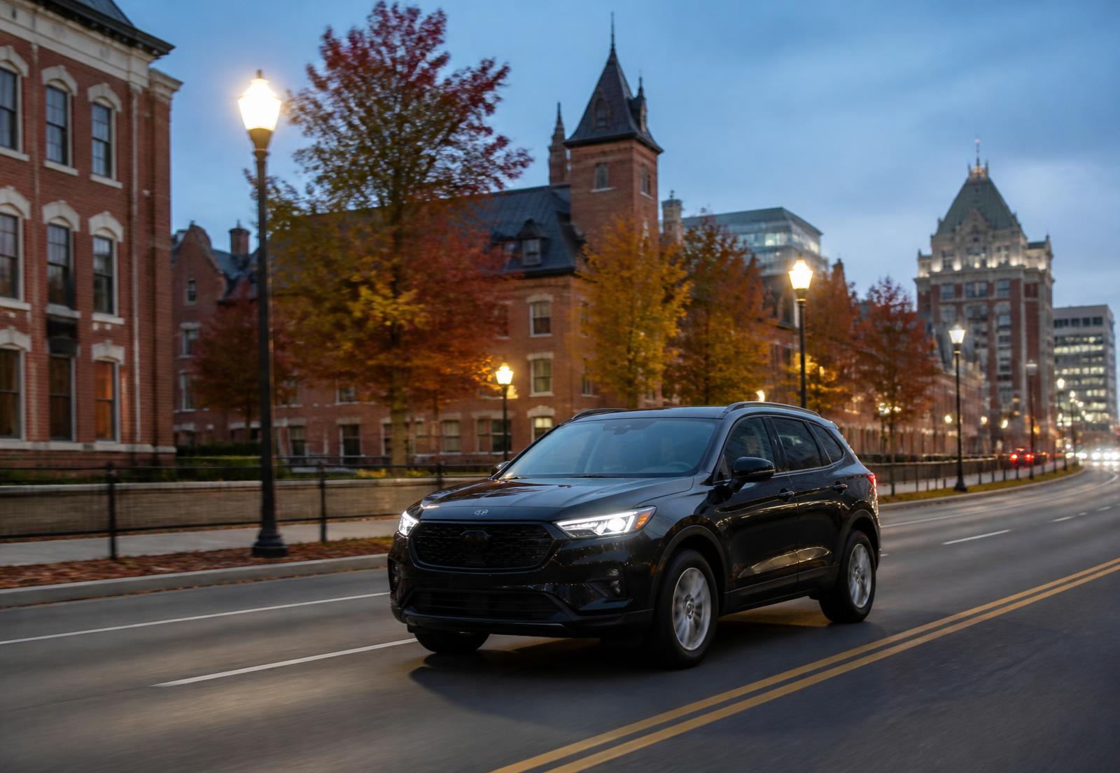 Clean black taxi SUV driving through downtown Schenectady, New York at dusk